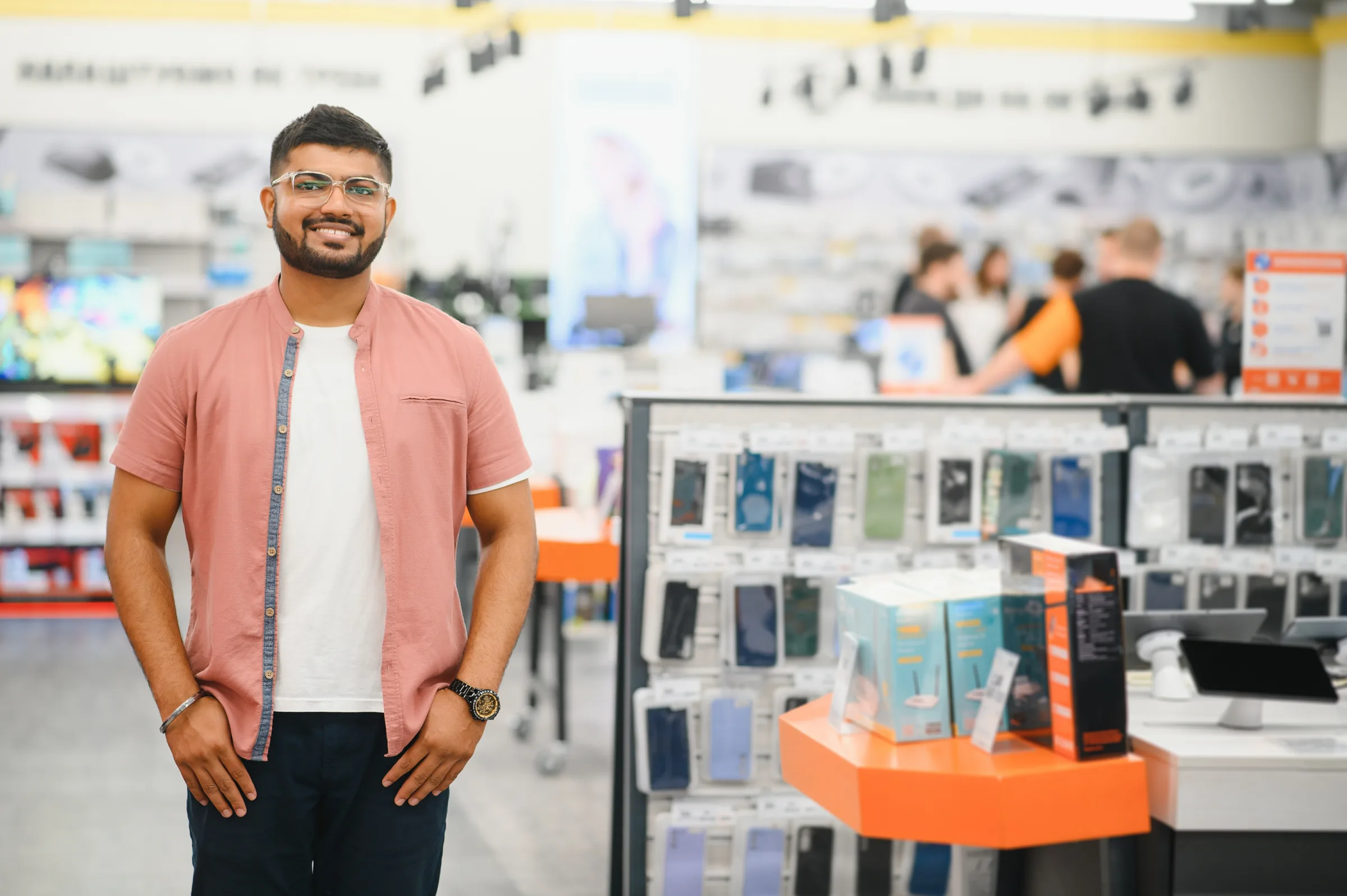 Retail associate in an electronics and appliances showroom