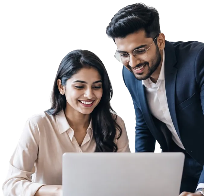 Two young professionals smiling at a laptop